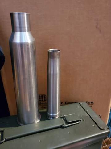 25mm Hotchkiss beside 20x138B